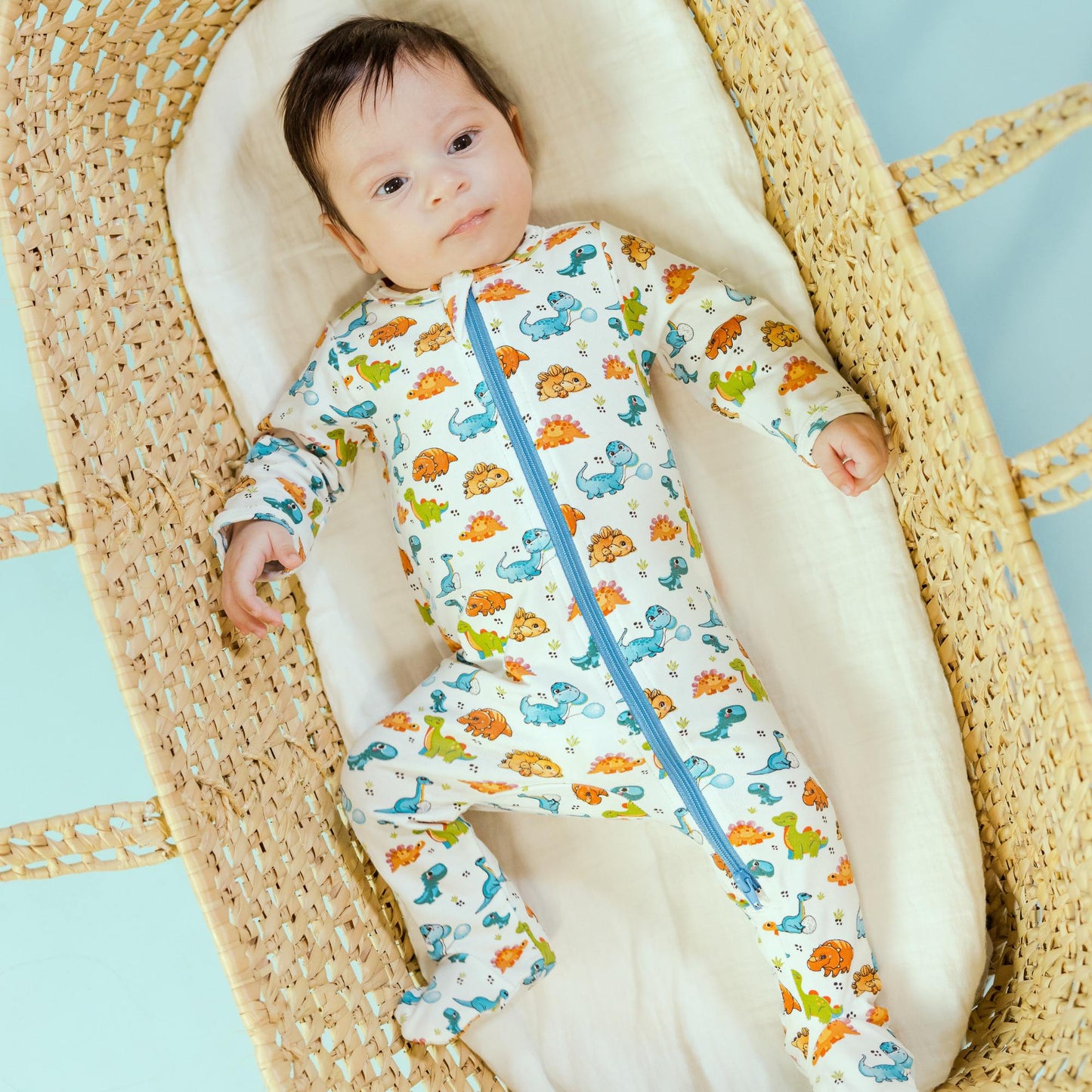 Norani Baby Footed Zipper ONesie in Dinosaurs