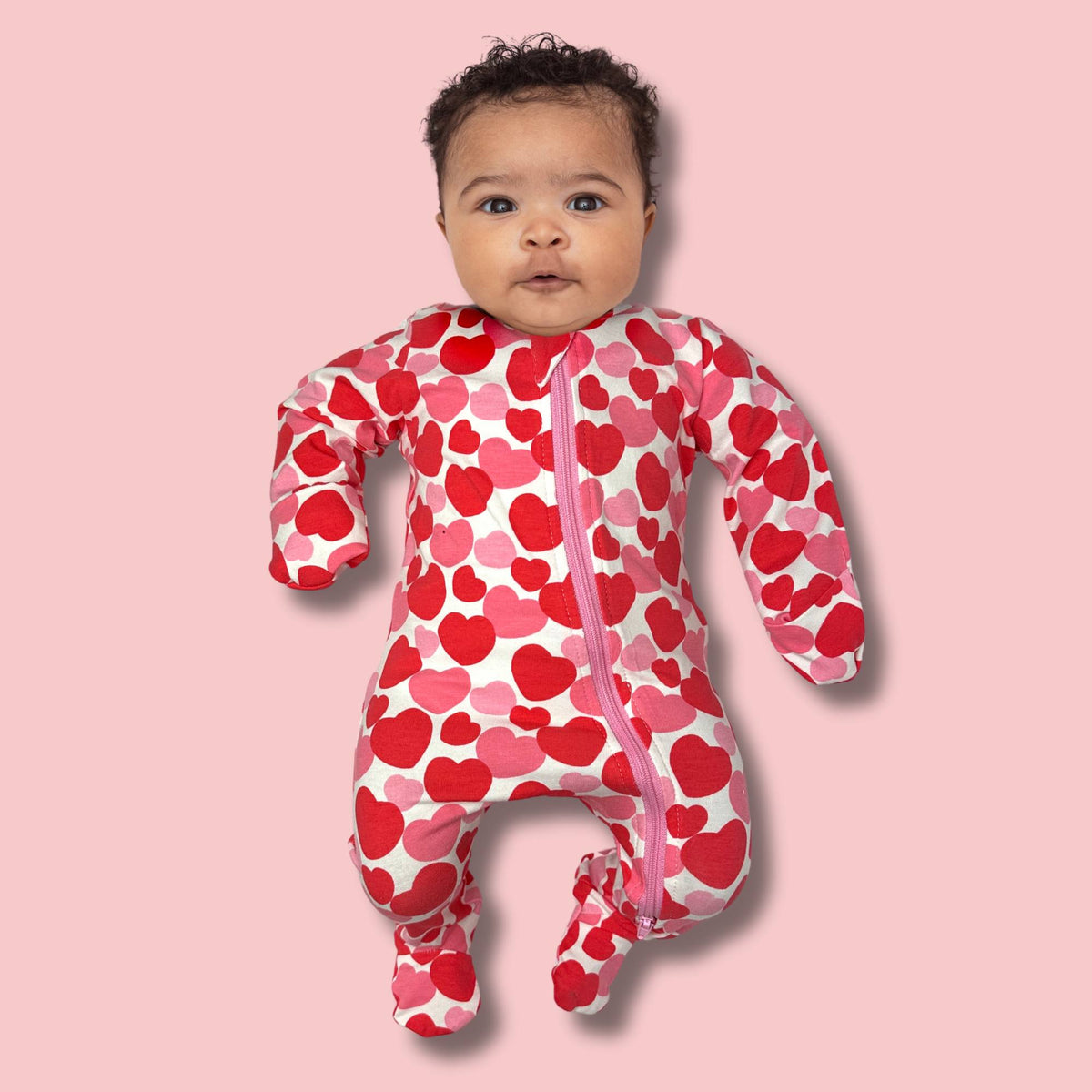 Norani Baby Footed Zipper Onesie in REd and Pink Hearts
