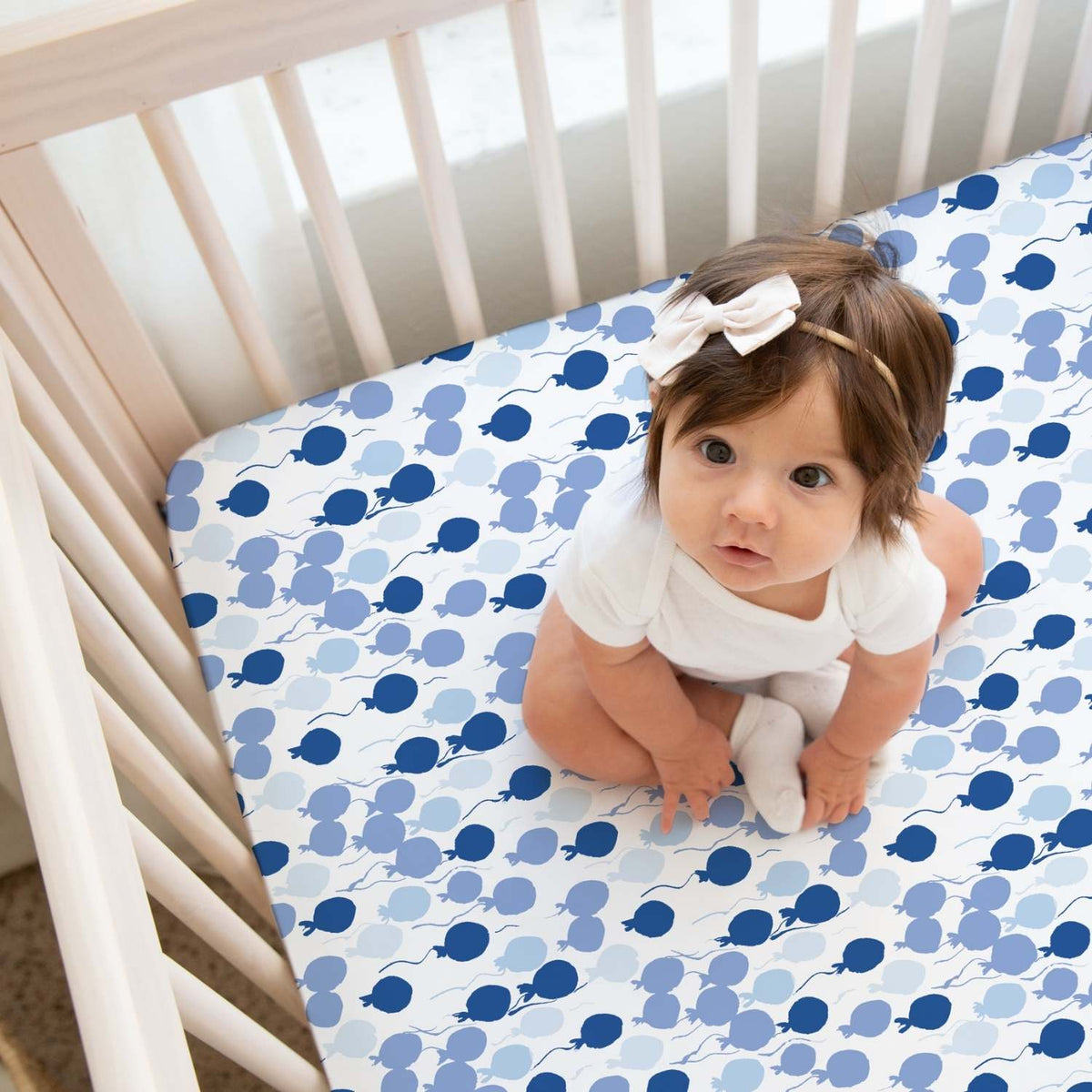Norani Baby Crib Sheet in Blue Balloons