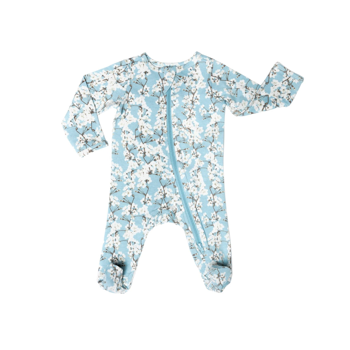 Norani Baby footed zippered onesie in blue and white cherry blossom flowers