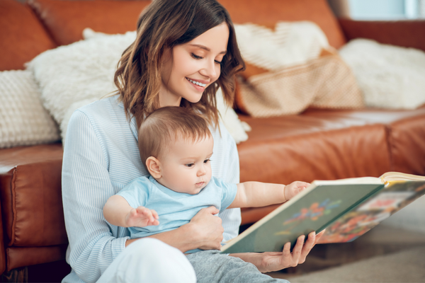 mother reading to baby 