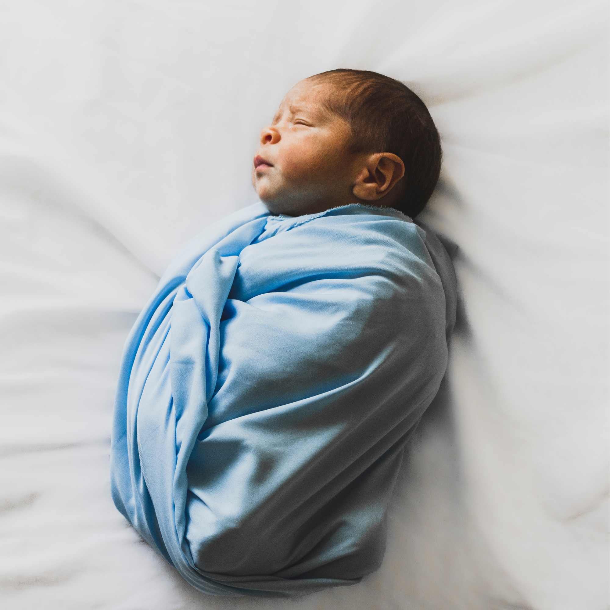 Baby Sleeping in a swaddle