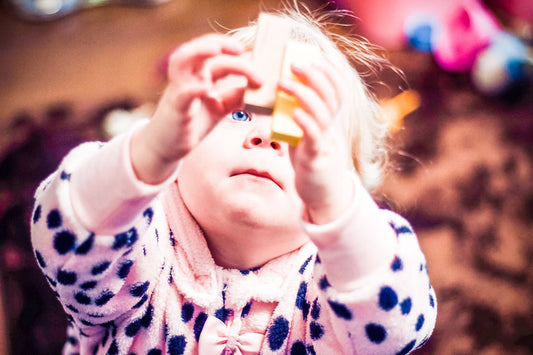 Developmental Milestones: Visual Motor Skills and Grasping Milestones - Norani Baby