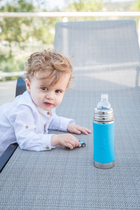 toddler with a sippy cup