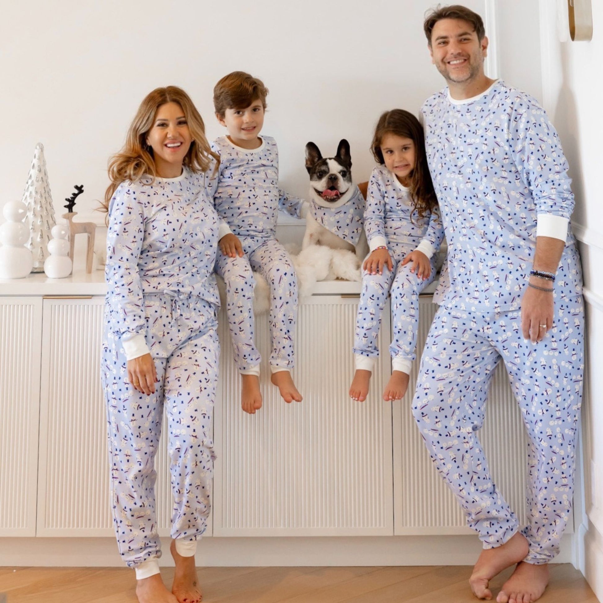 Norani Baby Holiday Matching family Pajamas for adults  and Kids in blue with melting snowmen