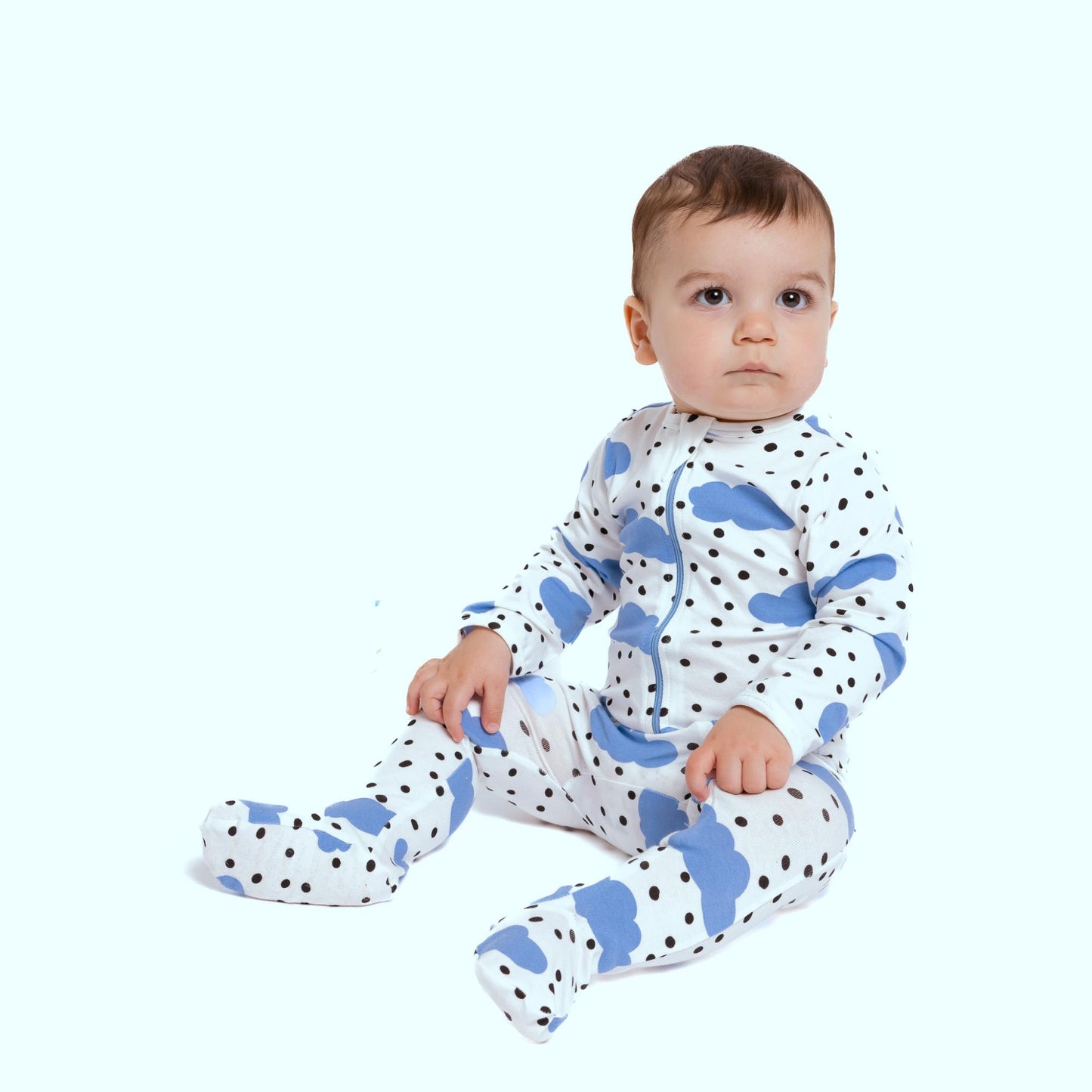 Norani Baby footed onesie baby blue and white happy clouds with polkadots with zipper
