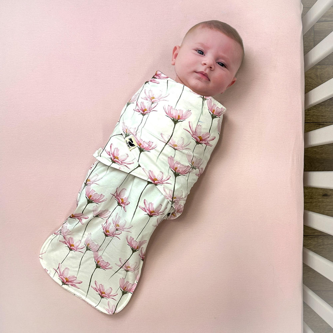 norani baby snugababe sleep pod in Pink and white petal flowers