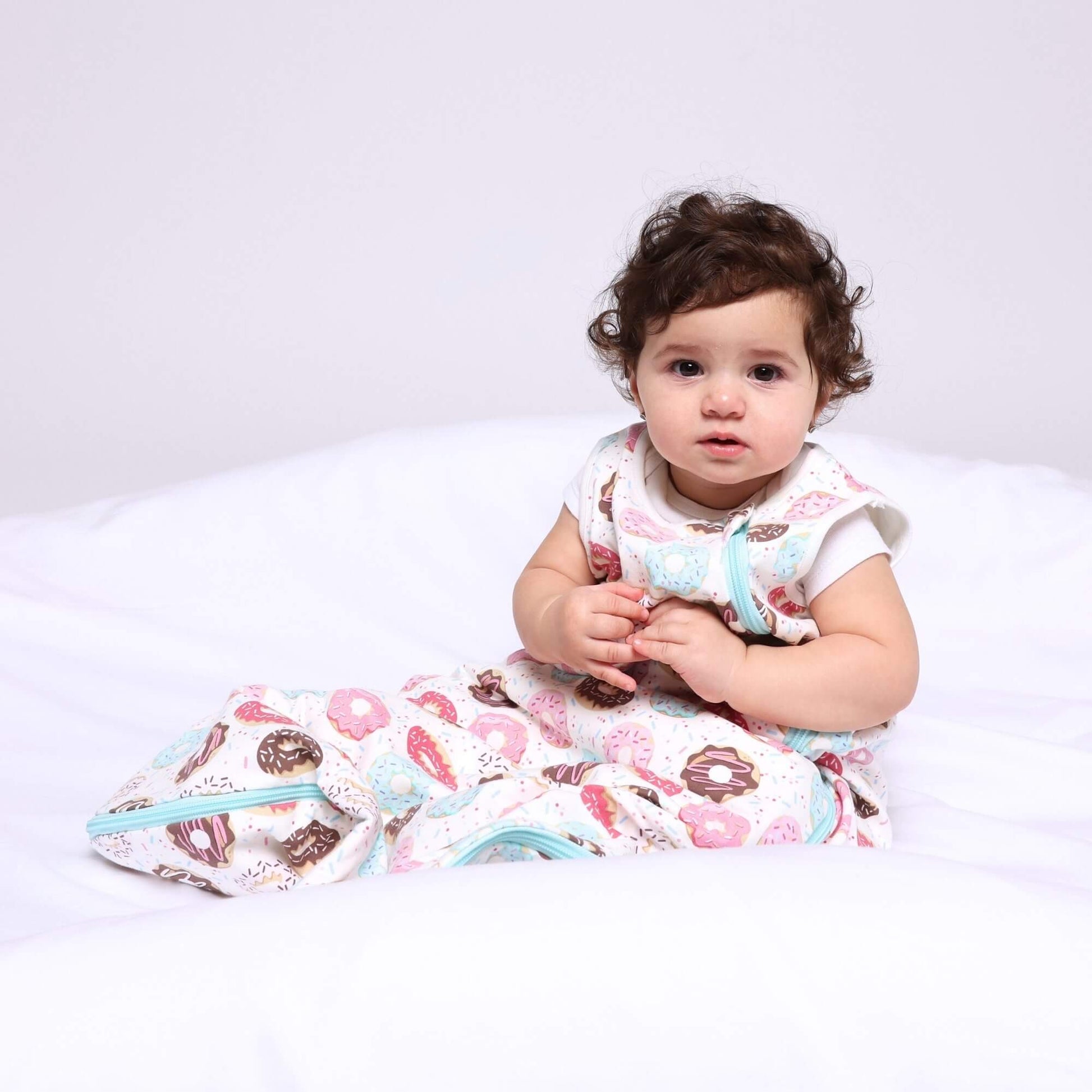 
Baby in Norani Baby One & Done Sleep Sack - Donuts