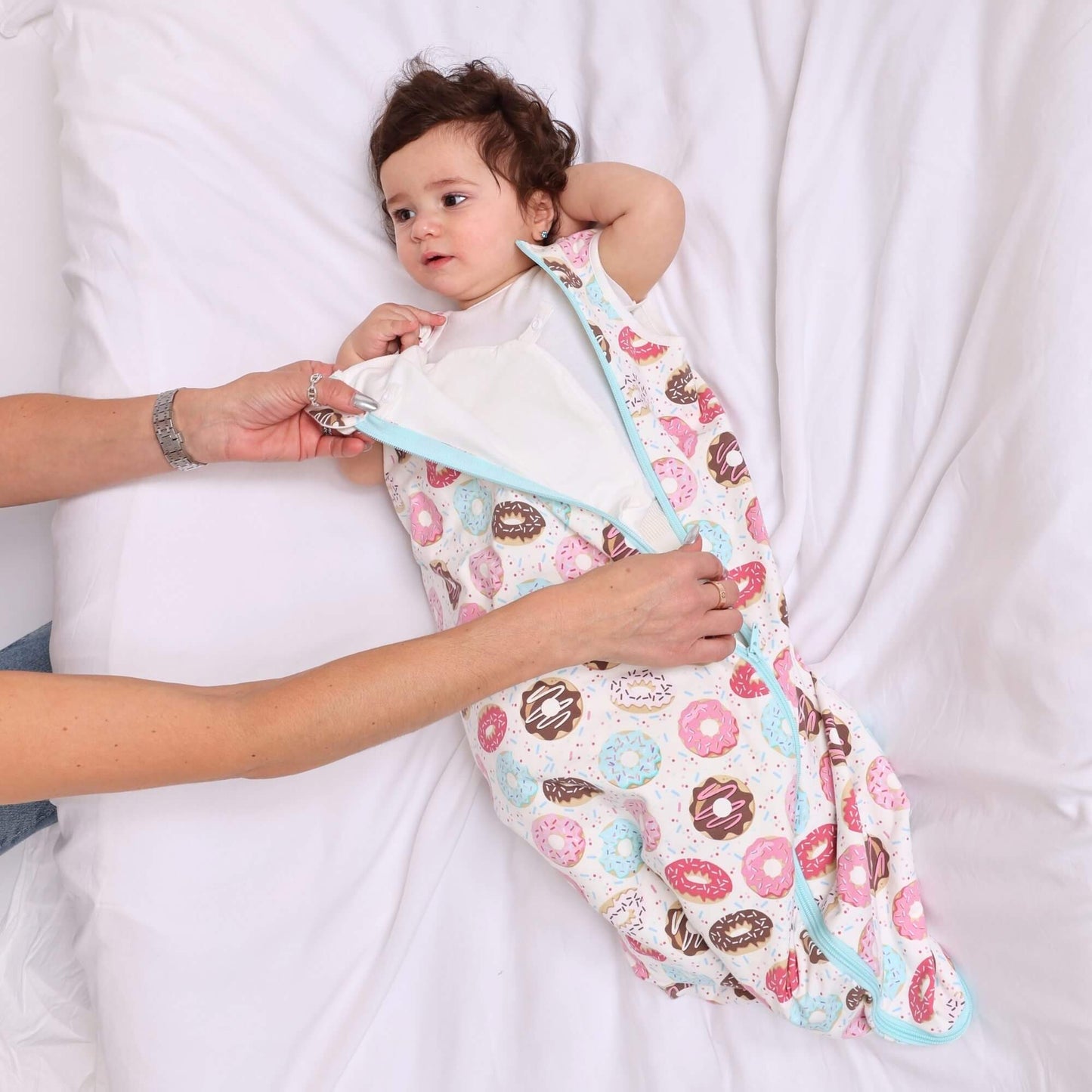 
Baby in Norani Baby One & Done Sleep Sack - Donuts