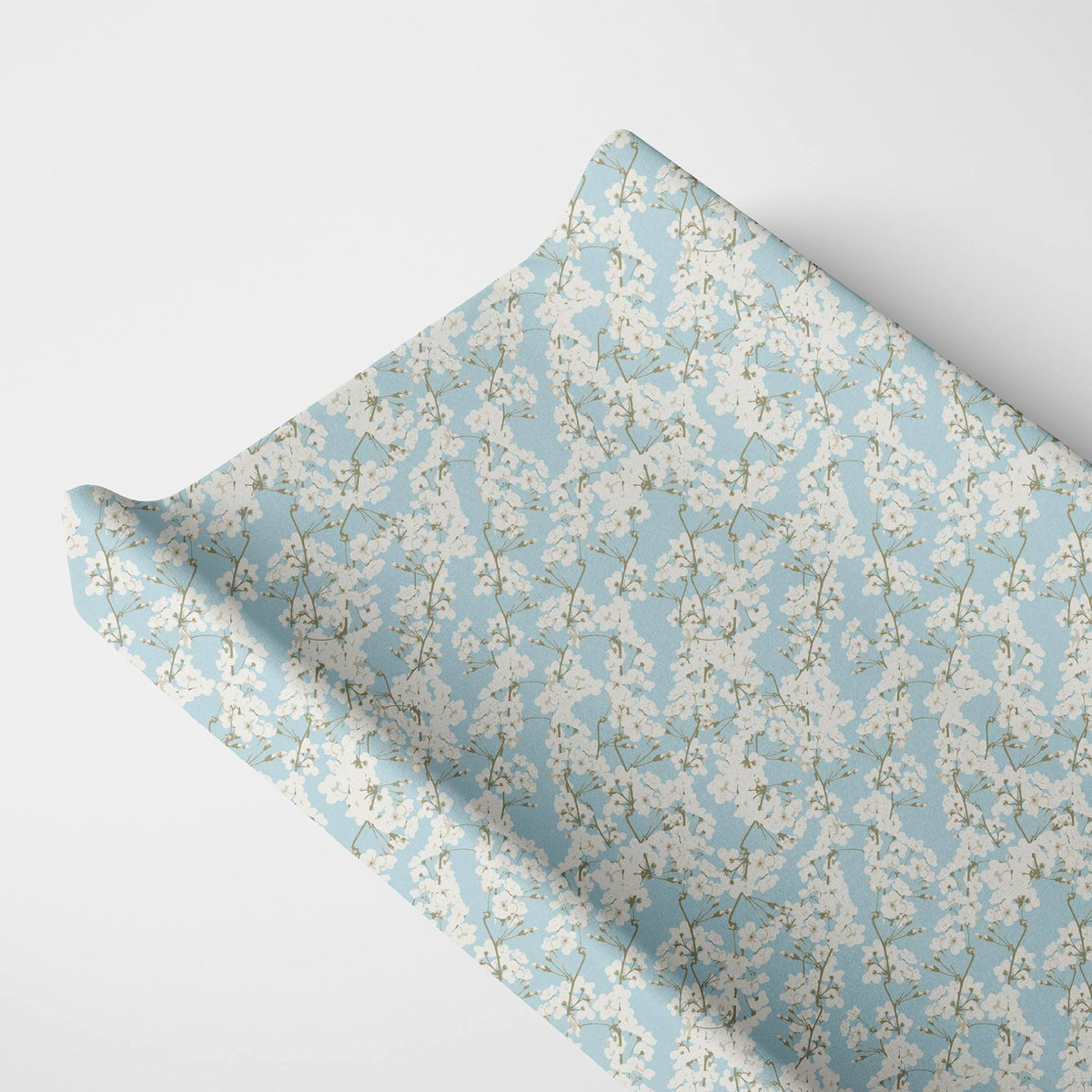 Norani Baby Changing Pad Cover in blue and white cherry blossom flowers