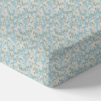 Norani Baby Fitted Crib Sheet in blue and white cherry blossom flowers