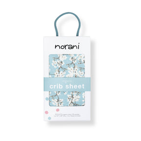 Norani Baby Fitted Crib Sheet in blue and white cherry blossom flowers