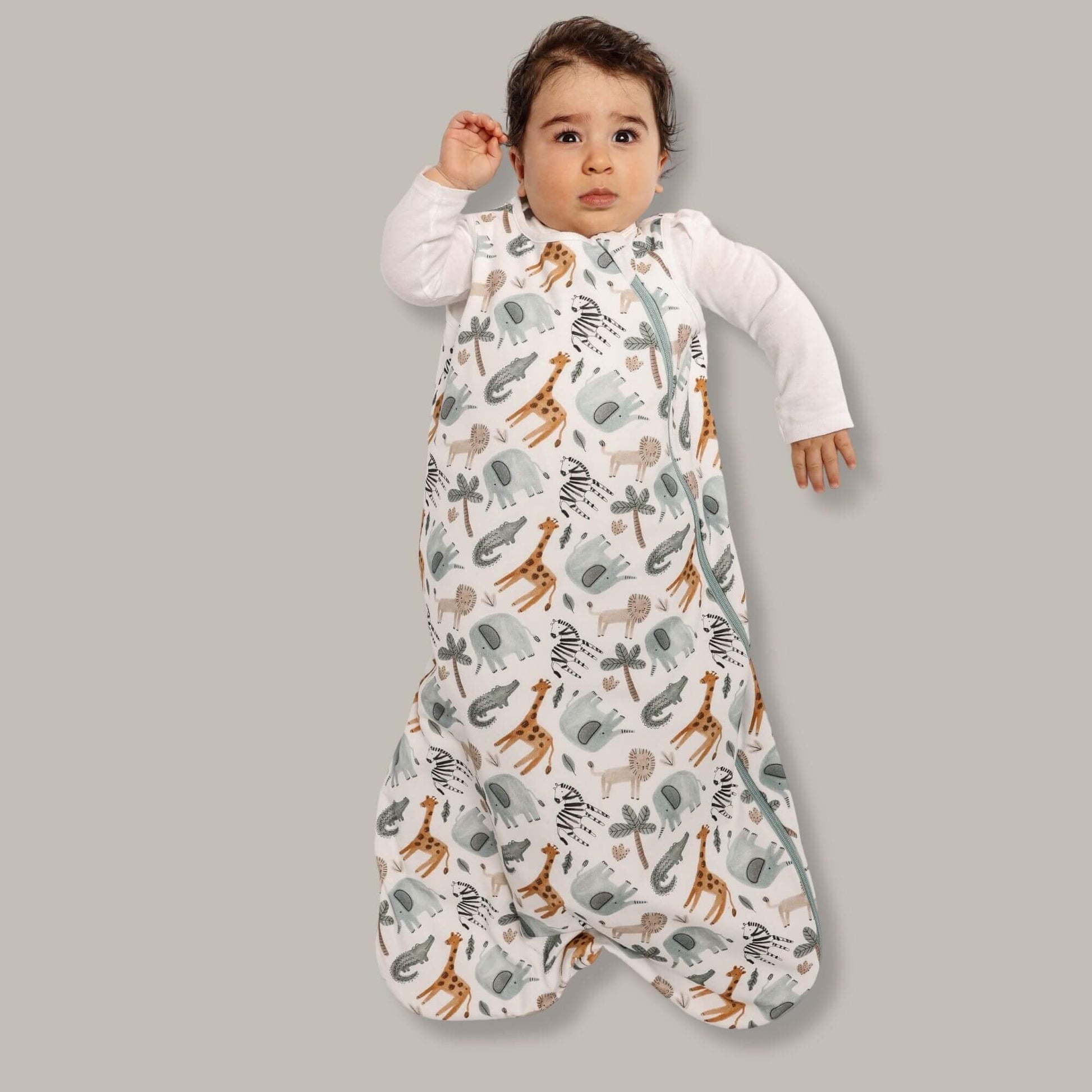 Baby in Norani Baby One & Done Sleep Sack - in Safari animals