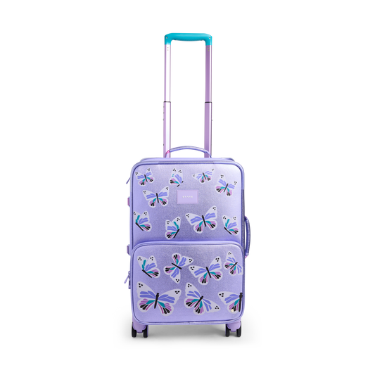 Purple suitcase with butterfly design on a white background