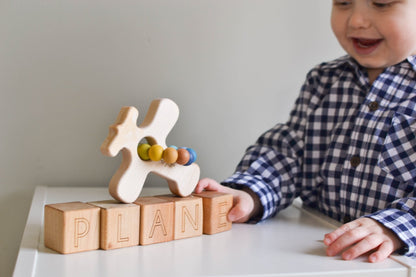 Airplane Wood Grasping Toy With Teething Beads - Norani Baby