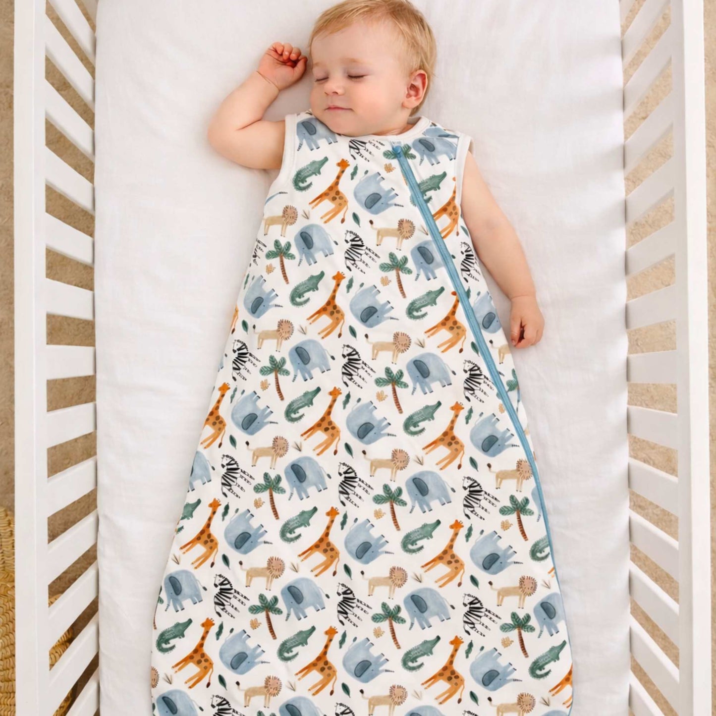 Baby in a crib wearing the  Norani Baby One & Done Sleep Sack - in Safari animals