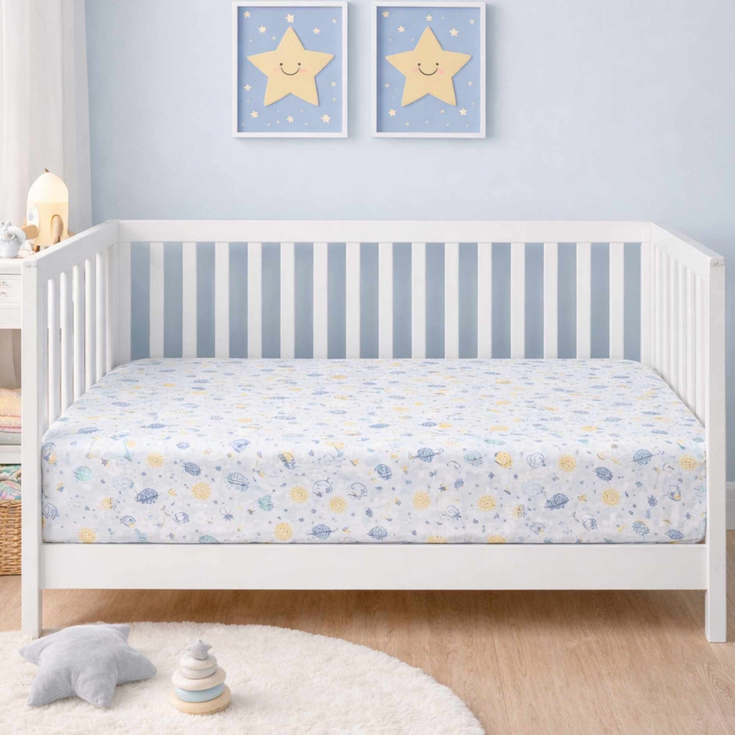 baby nursery showing off the norani baby space bears crib sheet.